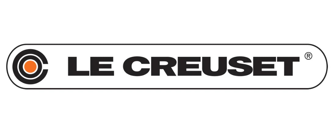 Le Creuset logo med sort tekst og orange cirkel-ikon på hvid baggrund